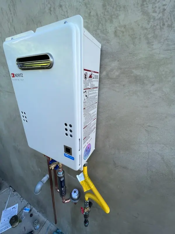 Tankless water heater installation for John T. White homes